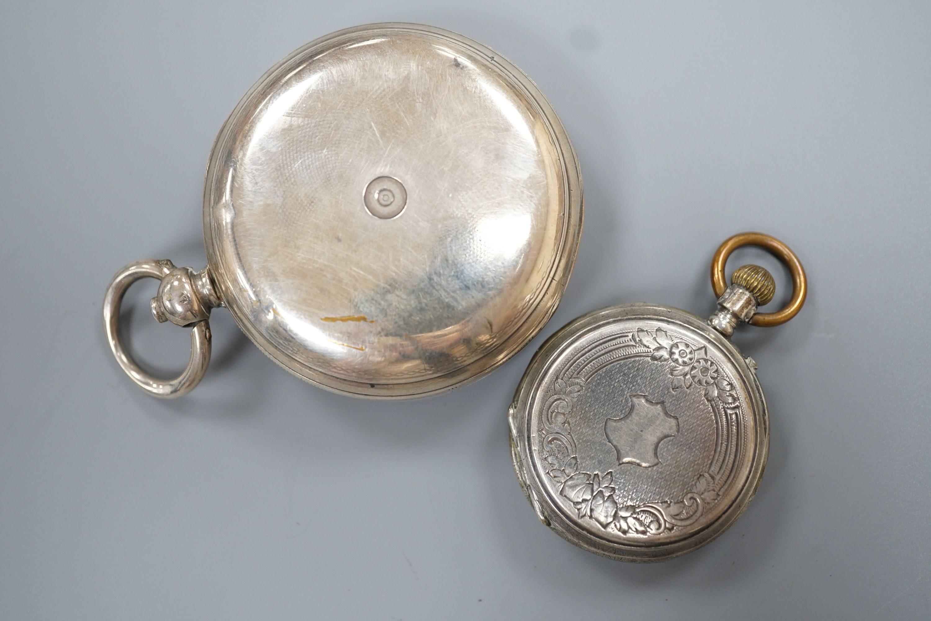 A Victorian silver keywind hunter pocket watch, case diameter 48mm and a white metal open face fob watch.